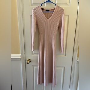 Long sweater dress.  Great with boots. Warm and stylish